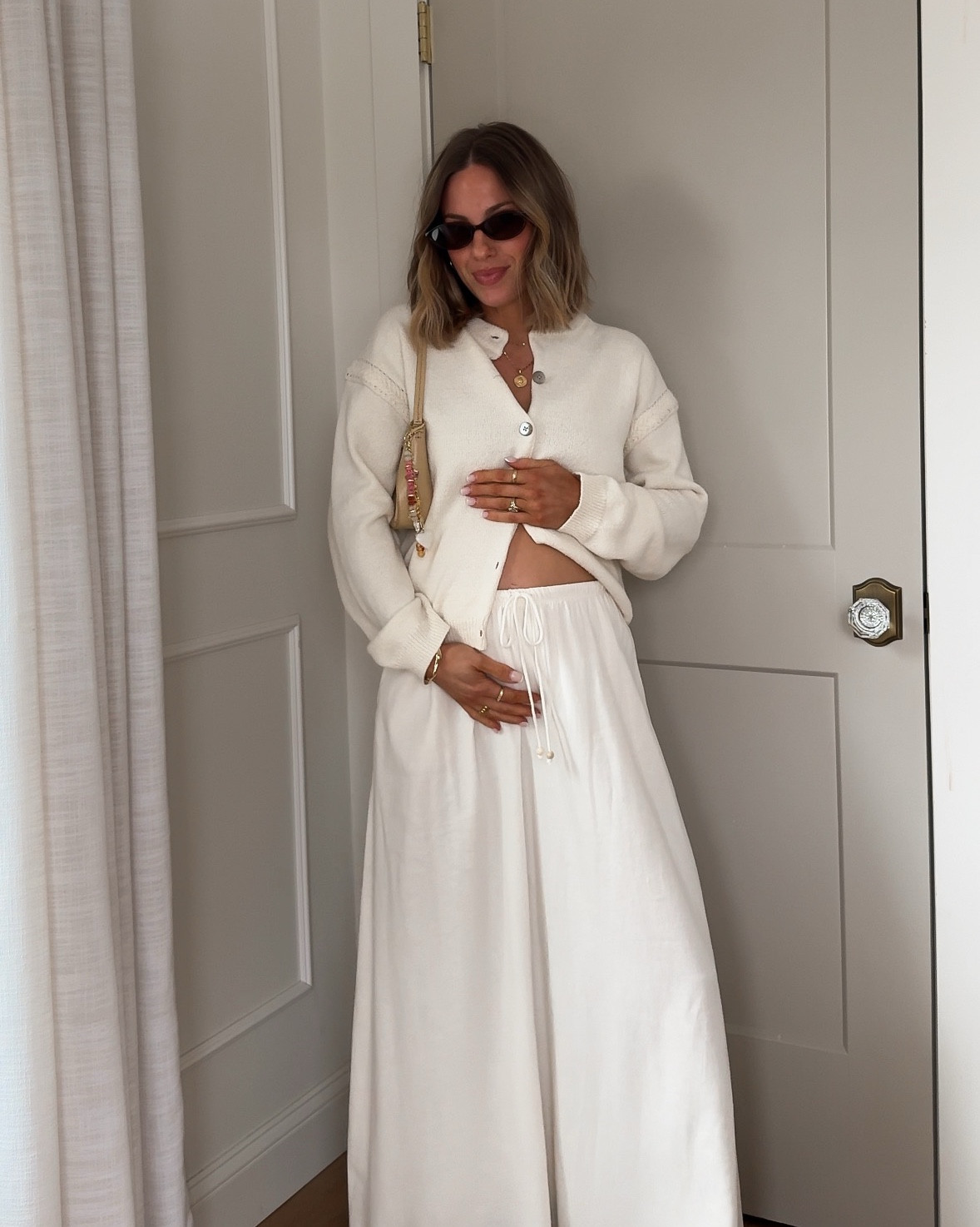 Spring bump style!  🌸🌷

Loving this monochromatic white moment! Skirt is so perfect & flowy 🤍 Wearing everything in a size small! 
 

#LTKootd #LTKBump #LTKmomlife