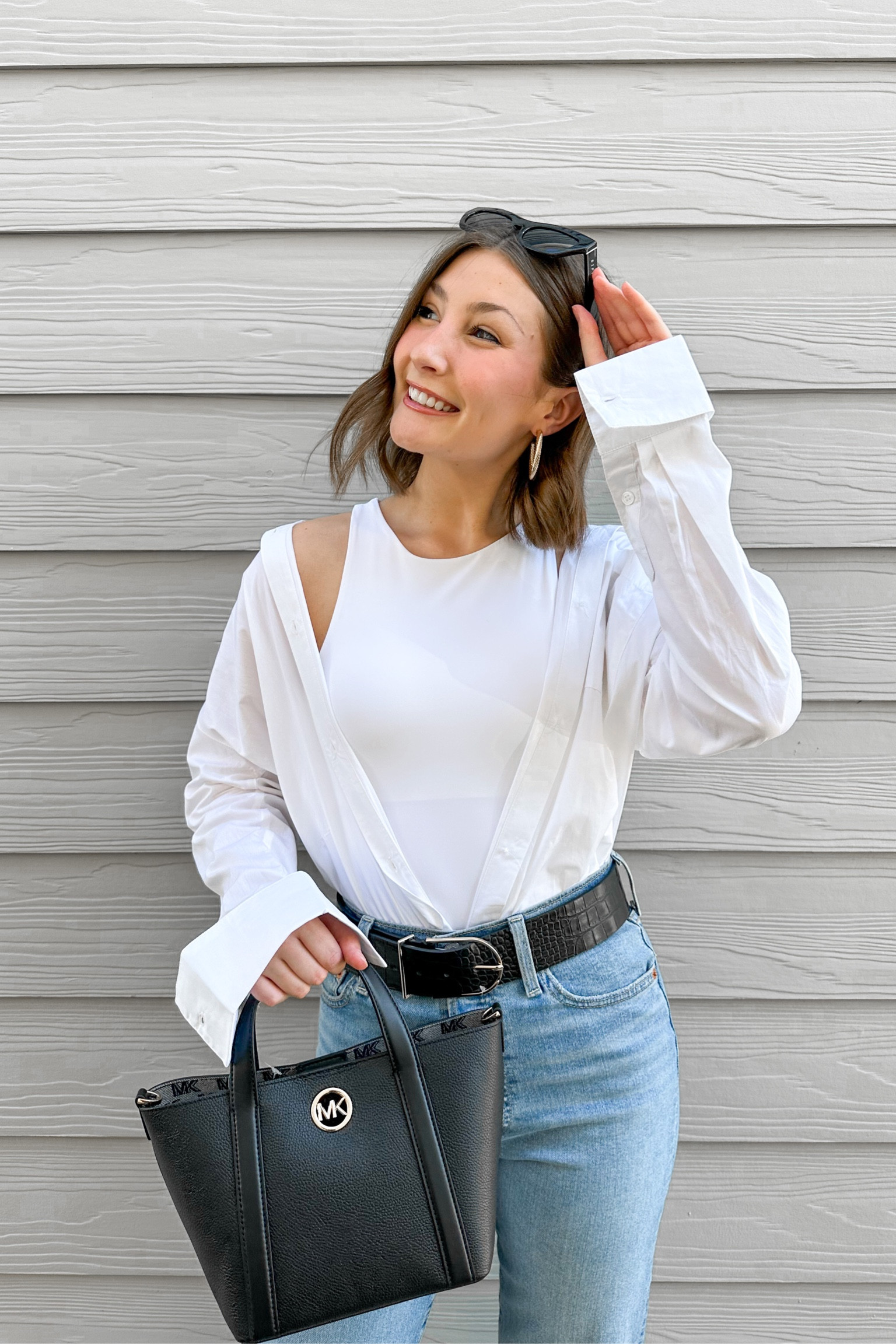 Fall transition outfit inspo! #whitebuttondown #bodysuit #levijeans #falltransitionoutfit #michaelkors

#LTKworkwear #LTKitbag #LTKstyletip