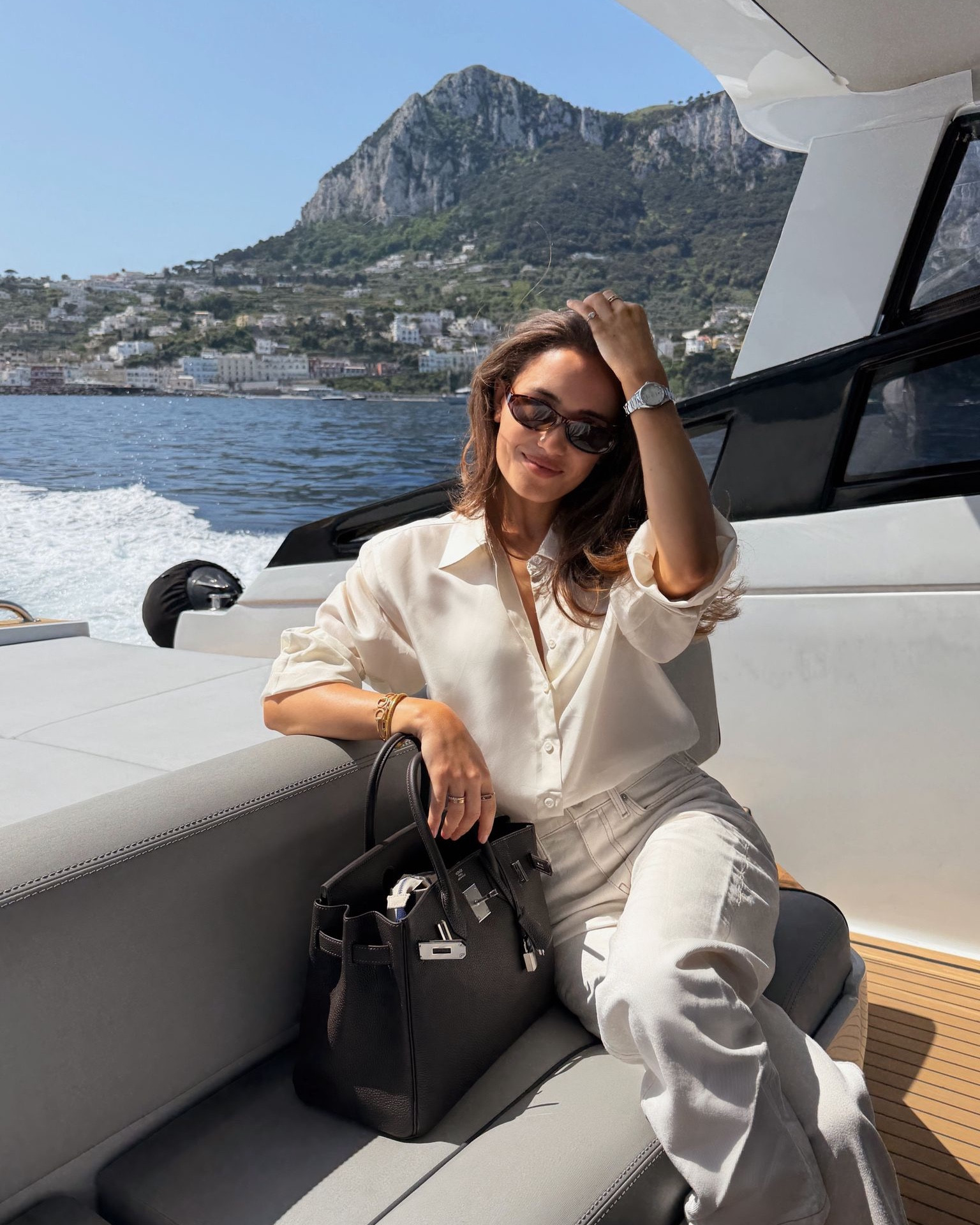 Exploring Capri by boat 🌊  Wearing Jigsaw silk shirt, Tommy Hilfiger Mom jeans and Loro Piana Summer Walks 

#LTKtravel #LTKeurope #LTKsummer