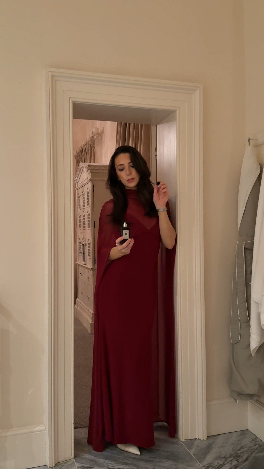 GRWM for the dinner party ❤️ I wear a size small in the dress and it fits perfectly! Lipgloss shade is ‘Rouge in Love’, Christmas party inspo, festive dress, burgundy dress, cape dress, cape maxi dress 

#LTKTall #LTKgrwm #LTKHoliday