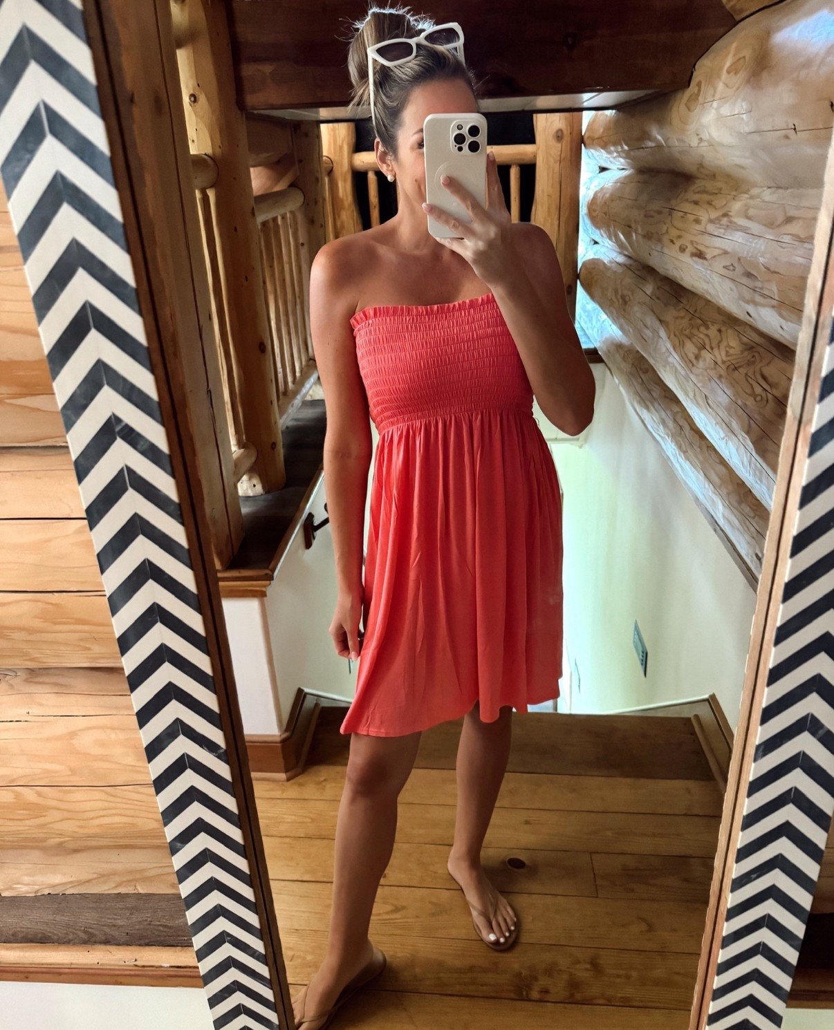 In a large coral smocked top strapless dress, sandals, sunglasses and accessories - fits TTS.

#LTKStyleTip #LTKFindsUnder50 #LTKSaleAlert