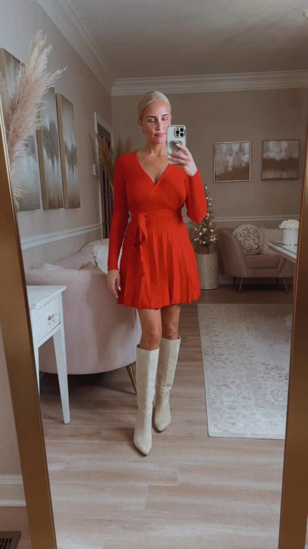 I tried on a ton of sweater dresses and this was my favorite. Loved it so much I got it in two colors. The flare shape is so flattering!! Nice high quality fabric. Looks orange in this video but is bright red in real life. 

#LTKHoliday #LTKSaleAlert #LTKSeasonal