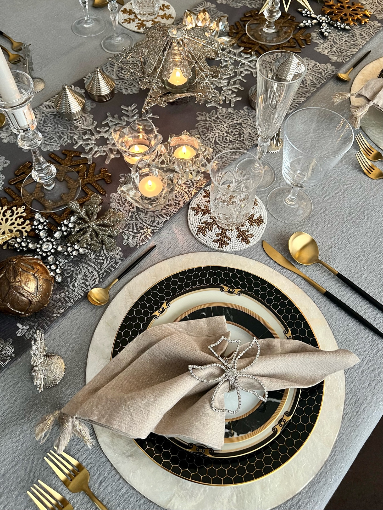 New Year’s Eve Table with my college son’s Christmas gift. 🖤💛 
What a sweet and thoughtful gift! 
I love these William Sonoma Honeycomb Dinner Plates. 

#LTKGiftGuide #LTKSeasonal #LTKHoliday
