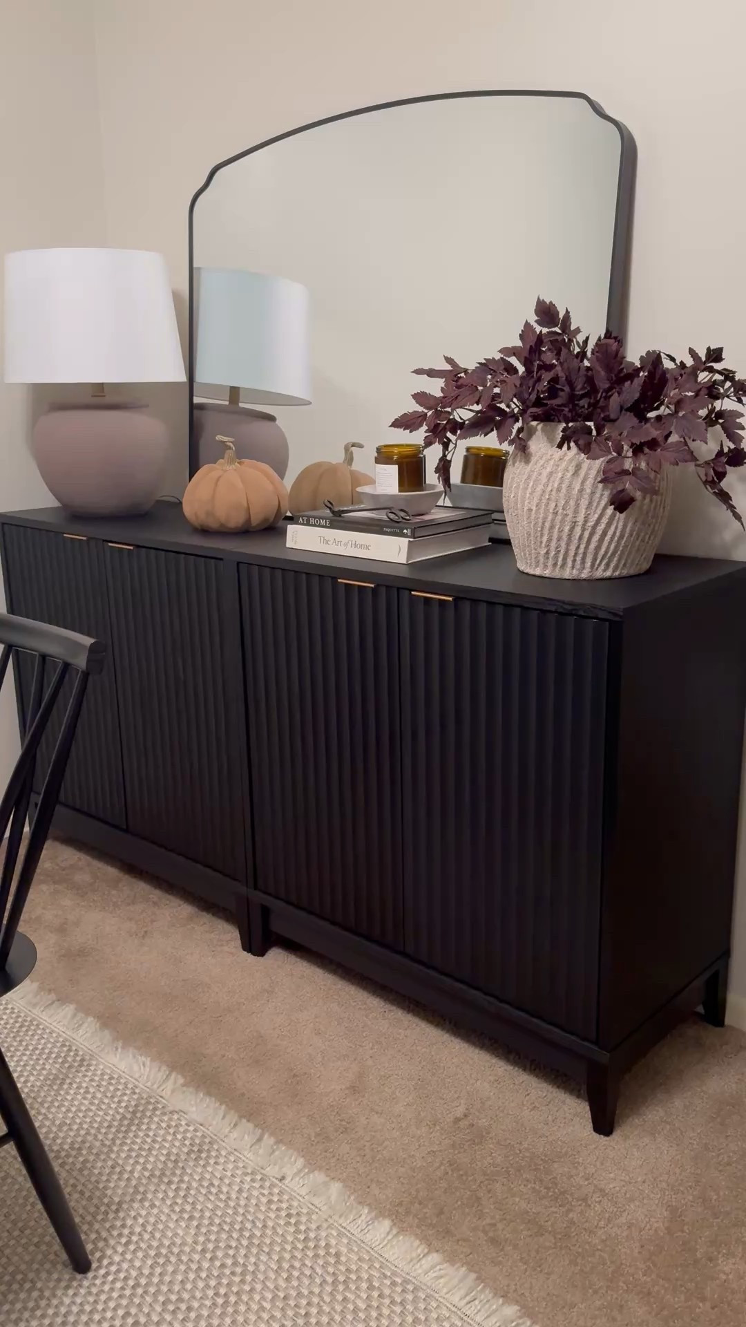 Dining room hutch, dining room styling, mopio,  black sideboard, black buffet table, concrete vase, beige vase, coffee table books, plum stems, Afloral 

#LTKHalloween #LTKHome #LTKSeasonal
