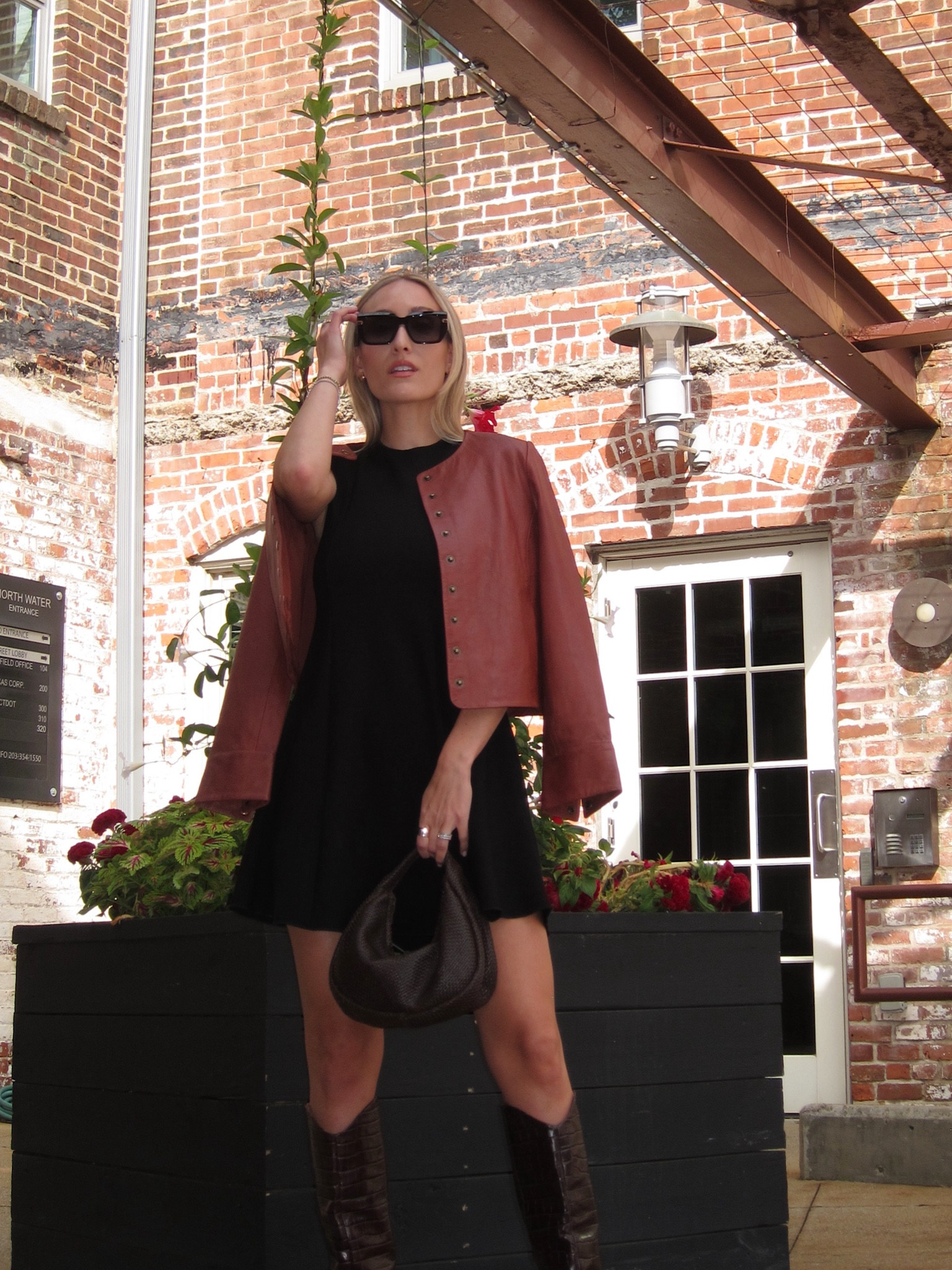 Fall outfit | leather woven bag | chocolate brown bag | black mini dress | knit black dress | red leather jacket | leather jacket | feroce sunglasses | schutz boots | croc boots 

#LTKSeasonal #LTKStyleTip #LTKShoeCrush