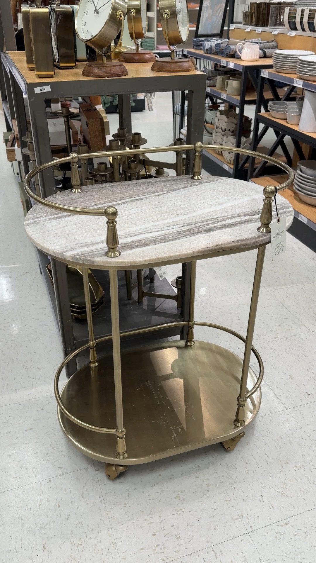 Such a pretty Target home find! ✨ The Metal & Marble Serving Cart from Hearth & Hand with Magnolia has the most beautiful mix of warm brass and marble, giving it such a refined, designer-inspired feel. 💫 Pieces like this instantly elevate a space while still being functional for everyday use. I spotted it in store recently and it truly looks even better in person. ☺️ Cheers! 🥂 #TargetHome #BarCart #HomeDecorFinds 

#LTKHome #LTKSaleAlert