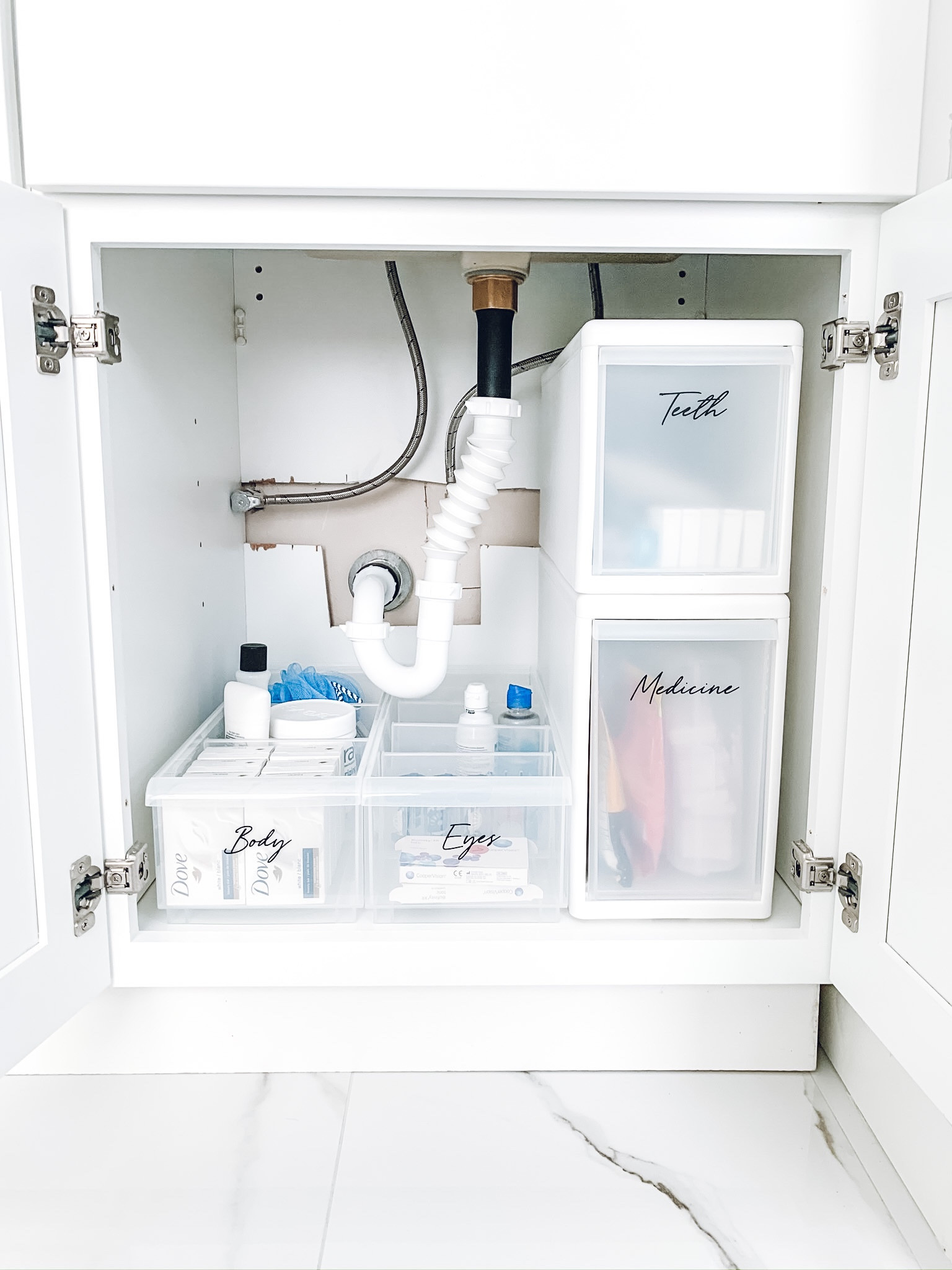 Under the sink organization. Savvy & Sorted bathroom labels. The Container Store STAK Bin. Like-It drawer✨

#LTKhome #LTKfamily #LTKbeauty