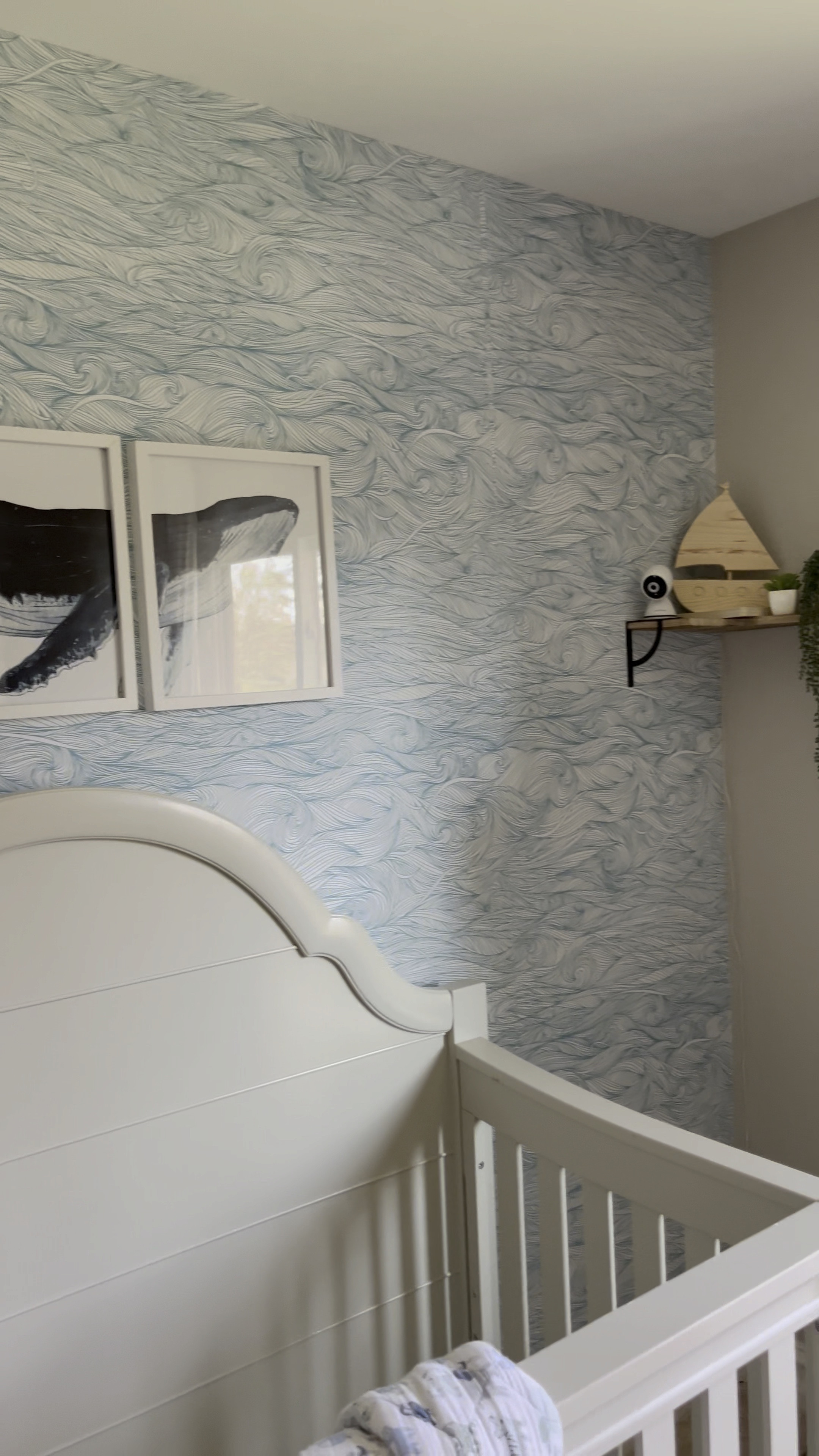 Are you hesitant about installing wallpaper yourself? I was too, but I gave it a try and it turned out really well! It's not perfect, but it's great. Despite a few imperfections, I'd definitely do it again for a low-traffic area, like my kids' bedroom. For high-traffic areas, though, I'd definitely hire a professional. The nursery for my boy ended up being special and meaningful without going overboard on the sailor or whale theme. 

#LTKStyleTip #LTKHome #LTKBaby