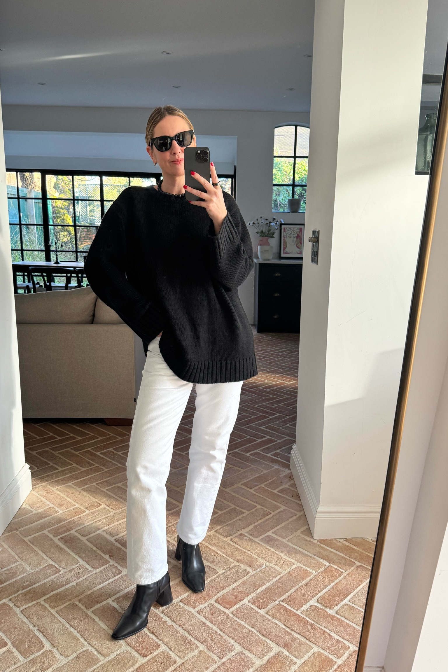 Oversized Black Knit + White Jeans + Low Heeled Boots | How to style white jeans in winter | casual outfit | pub outfit | brunch outfit | sunday roast outfit 

#LTKstyletip #LTKeurope #LTKuk