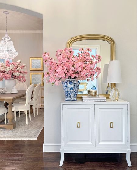 Spring entryway refresh 💗💙 white accent cabinet, white and gold console table, dining room, modern, grandmillennial decor traditional glam decor blue and white decor ginger jars cherry blossom stems spring decor crystal lamp 

#LTKunder50 #LTKsalealert #LTKhome
