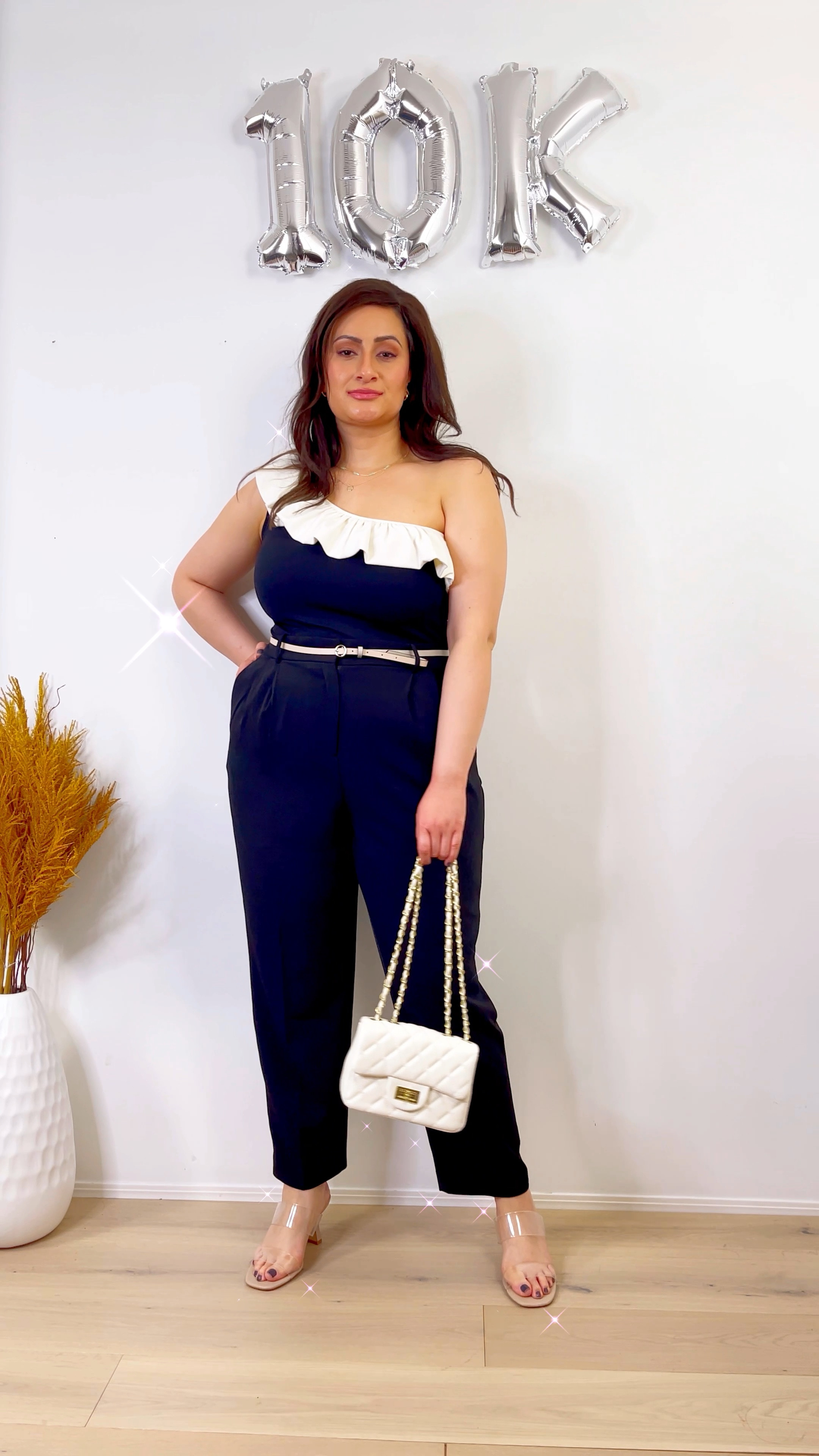 Date night chic outfit from H&M 
High waisted ankle crop dress pants, skinny belt, ruffle one shoulder top, clear sandals. Purse from Amazon 

#LTKFind #LTKunder50 #LTKworkwear