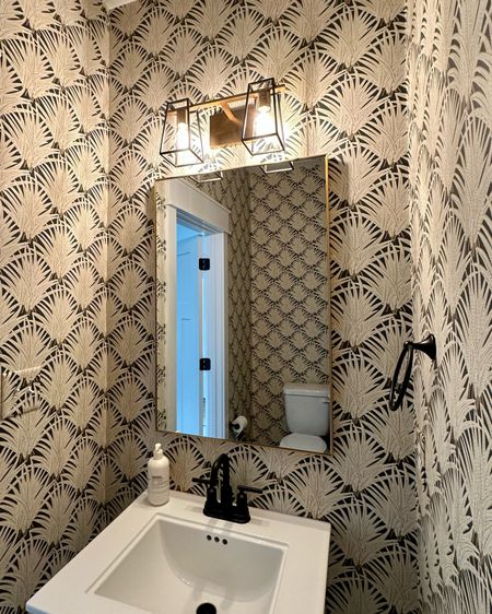 Powder room mirror, wallpaper, vanity lighting

#LTKhome
