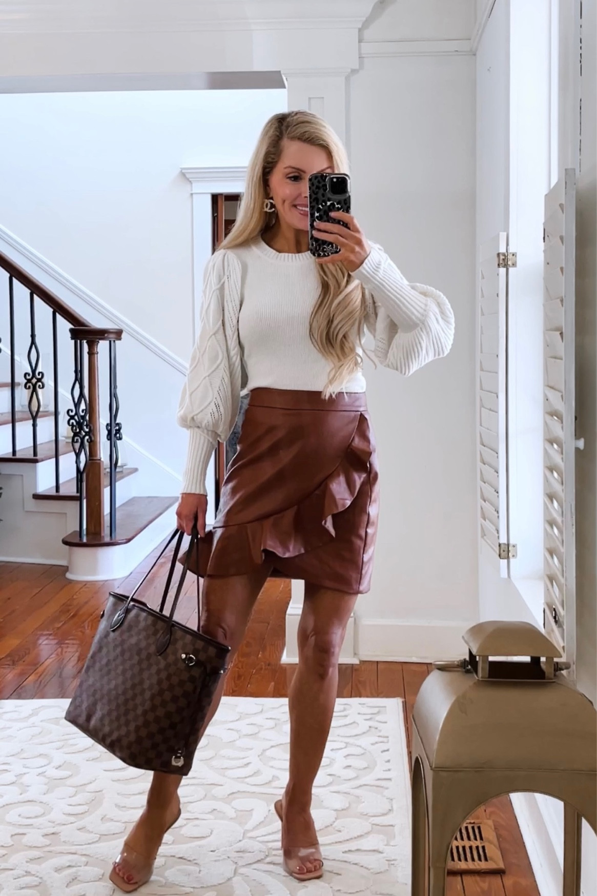 This ruffle front faux leather skirt is a show stopper piece : now available in 3 different colors ! Also , Linking a similar sweater 
•
•
•
Faux leather skirt
Mini skirt 
Petite outfit 
Petite skirt 
Date night outfit 
Girls night outfit 
Winter outfit 
Cable knit sweater
Neutral outfit 

#LTKworkwear #LTKFind #LTKSeasonal
