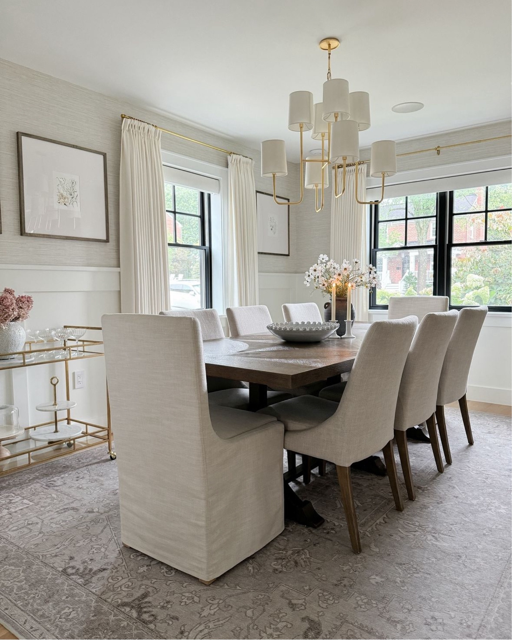 Dining room design, dining room inspo, traditional design, grasscloth wallpaper, wainscoting, neutral dining room, gallery frames, Studio McGee, McGee & co, dining table centerpiece, gold dining chandelier, wood trestle table, upholstered chairs, affordable finds, tjmaxx finds, marshalls find, look for less, dining room, high end look for less, serene, calm, family friendly, Benjamin Moore Simply White paint, washable rug, dining room rug ideas, transitional design, traditional home, high end look for less, affordable finds

Dining Room Curtain Details:
TWOPAGES Isabella Custom Curtains
Color: Off White/Creamy White 7084-5
Hanging Header Style: Triple Pleat
Width: 75" wide
Length (Height): 90” long
Lining: Room Darkening Liner, 140GSM
Body Memory Shaped: Yes
Hardware Details:
Finish: Brass
Diameter: 0.75”
Rings: 0.75” (1 1/2” diameter)


#LTKStyleTip #LTKSaleAlert #LTKHome