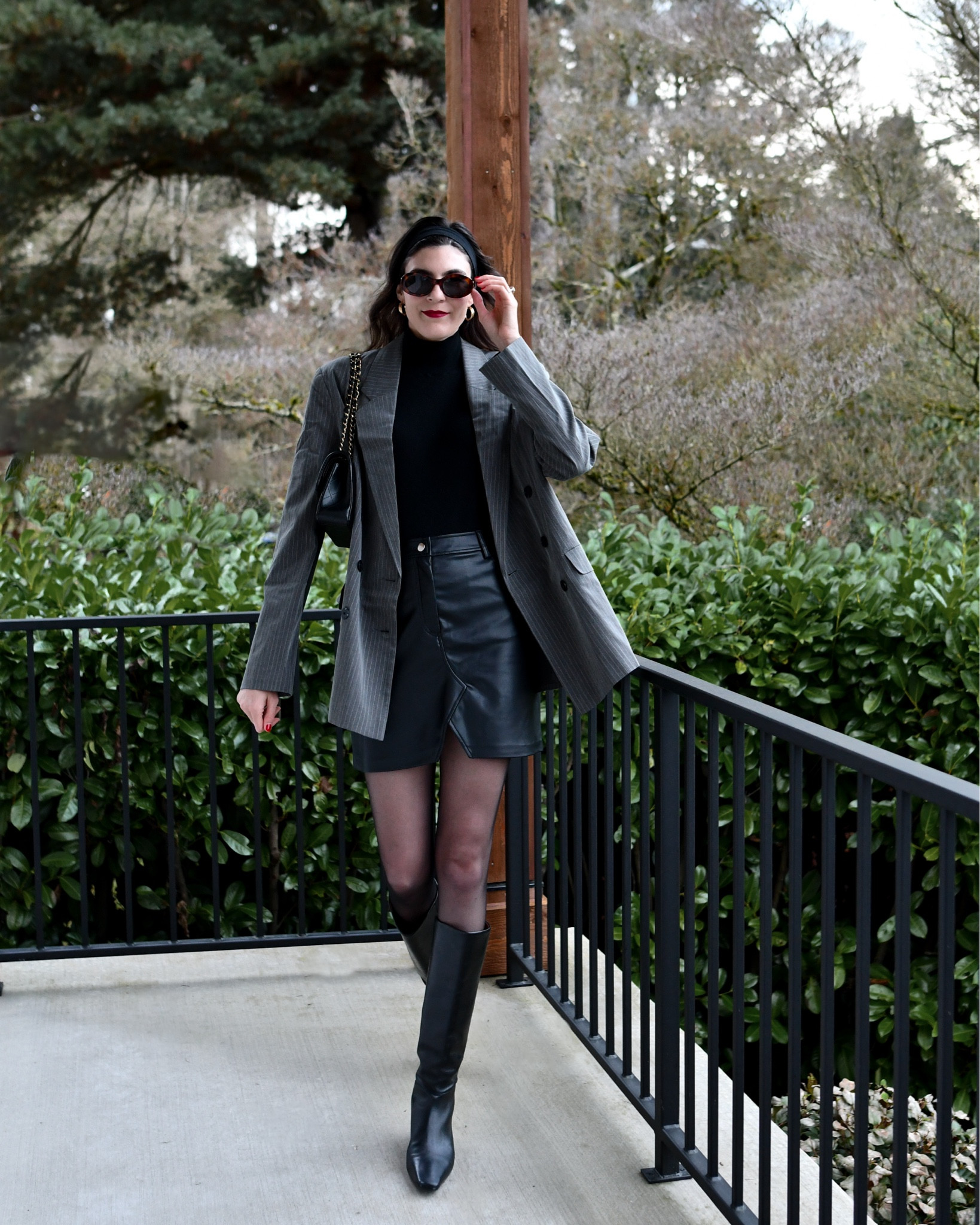 Oversized blazer, mock neck top, faux leather mini skirt, knee high kitten heel boots. 

#LTKworkwear #LTKshoecrush #LTKfindsunder100