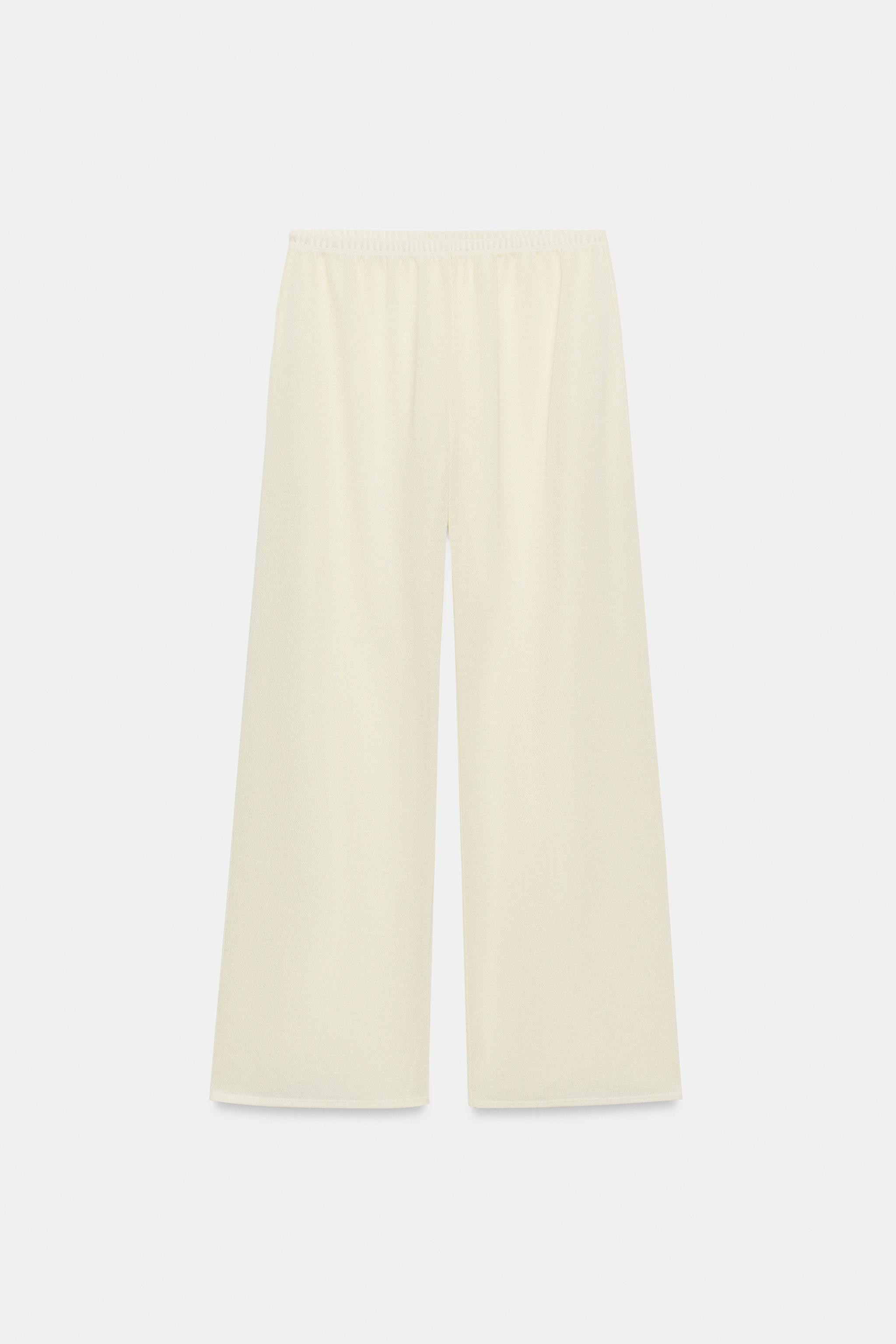Pants made with viscose blend yarn. Mid-rise with an elastic waistband. Straight leg. | Zara US
