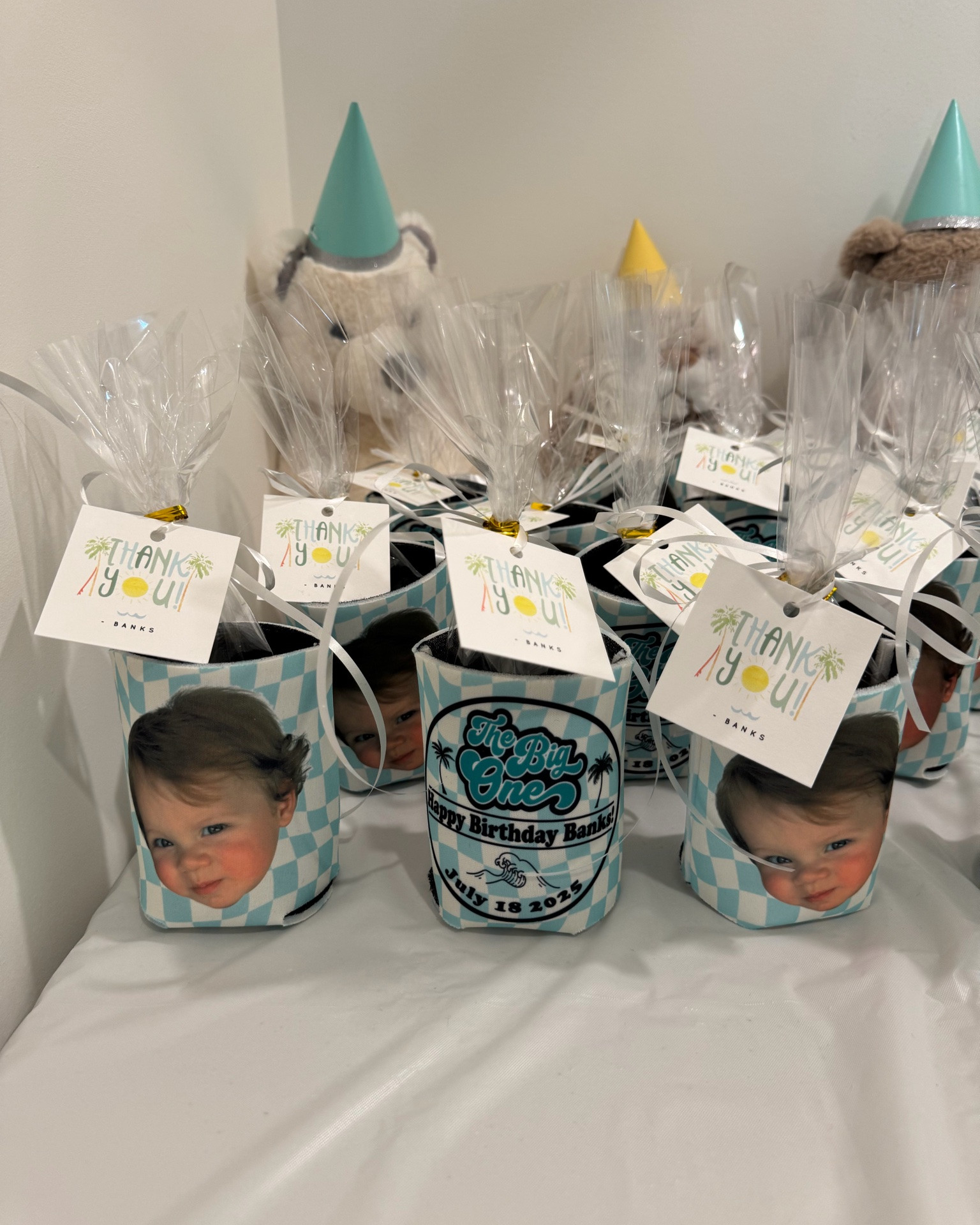 First birthday party favors & other decorations I used for Banksy’s party — everyone loved these personalized koozies! I had little bags of candy inside #LTKFamily

#LTKBaby #LTKKids #LTKmomlife