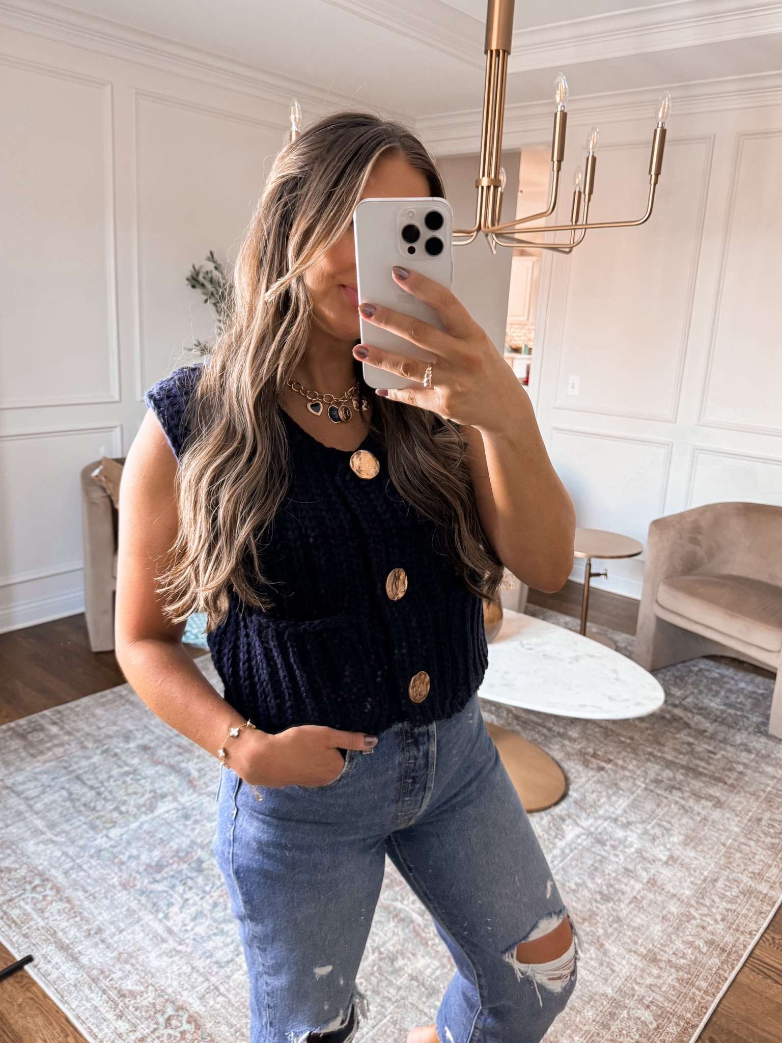 The cutest Amazon sweater vest with functional buttons makes for the perfect end of summer early fall top! I’m wearing a medium and sized up in the jeans 



#LTKFindsUnder50 #LTKStyleTip #LTKSeasonal