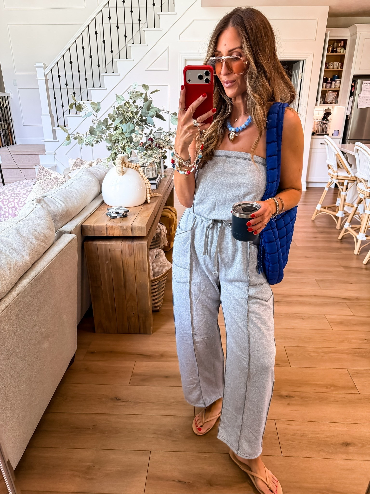 This easy one piece jumpsuit is the definition of throw on and go style. I love how relaxed and comfy it feels while still looking put together, and the pop of blue accessories makes it feel so fun for summer errands, travel days, or everyday mom life.

gray jumpsuit, casual summer outfit, one piece outfit, comfy mom style, everyday outfit inspiration, travel outfit idea, effortless summer style, wide leg jumpsuit, casual chic fashion, elevated basics, mom on the go outfit, themominstyle

#LTKTravel #LTKOver40 #LTKootd