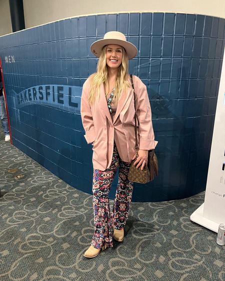 Country Music Concert Outfit

bell bottoms, pink blazer, squash blossom, cowboy hat, cowboy boots, fringe purse

#LTKshoecrush #LTKmidsize #LTKitbag