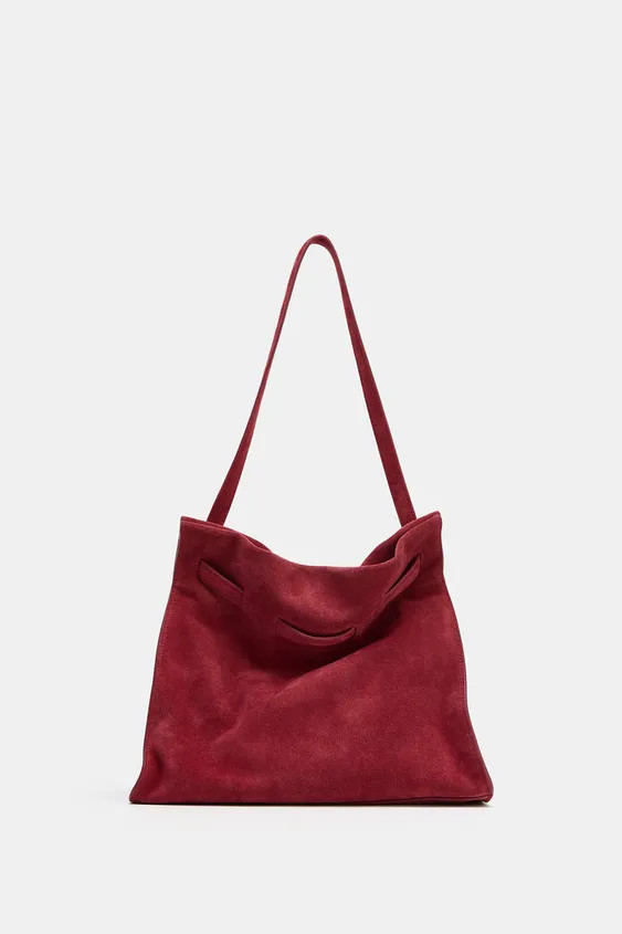 Split suede shoulder bag. Interwoven strap detail on the front. Shoulder strap. Interior pocket w... | Zara AU