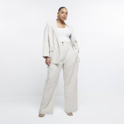 Plus beige wide leg pleated trousers | River Island (UK & IE)