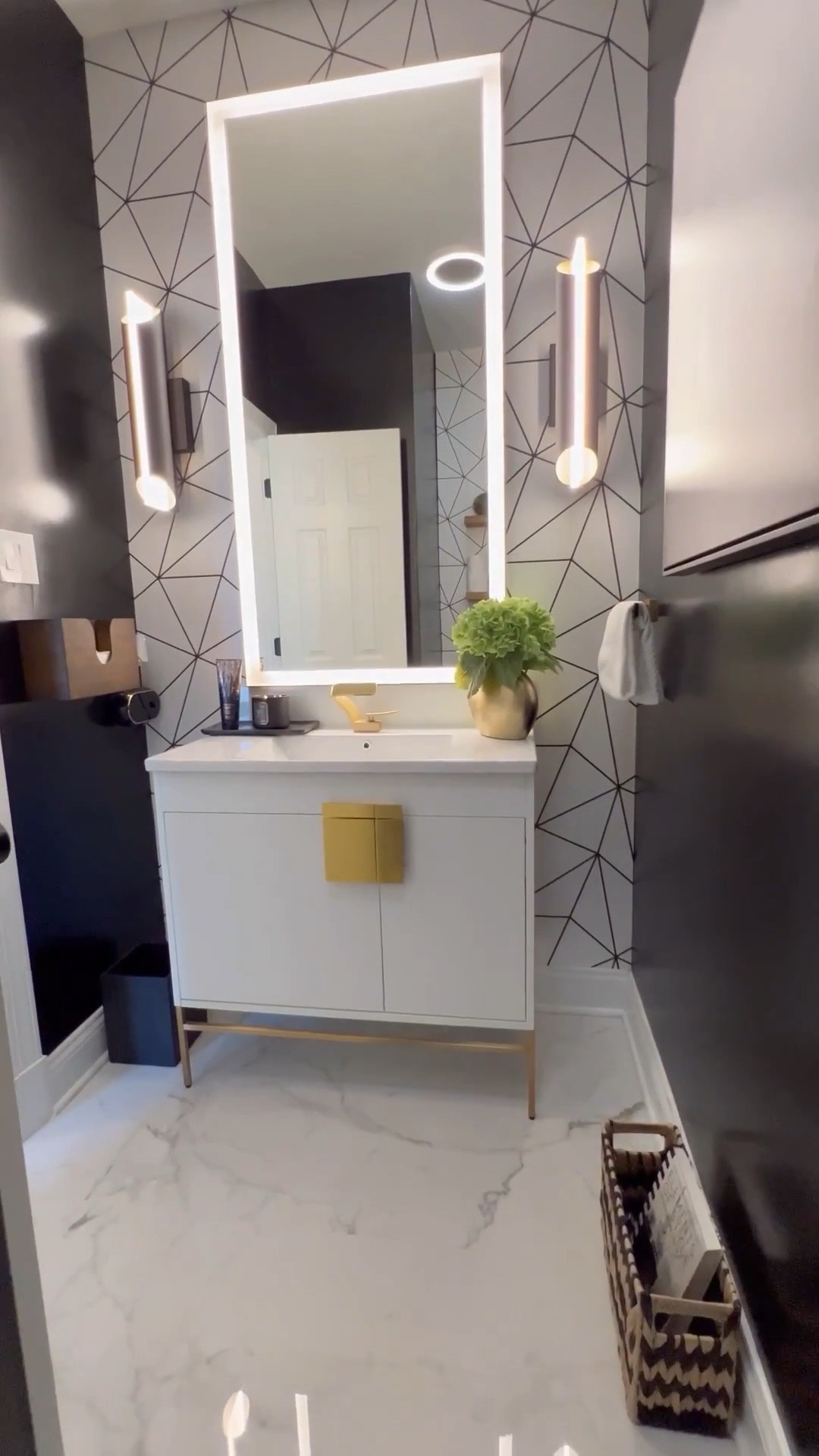 Before and after powder bath transformation with the power of wallpaper! I love this moody space, this gorgeous vanity is from Wayfair 👌🏾 #wayday

#LTKHome #LTKSaleAlert