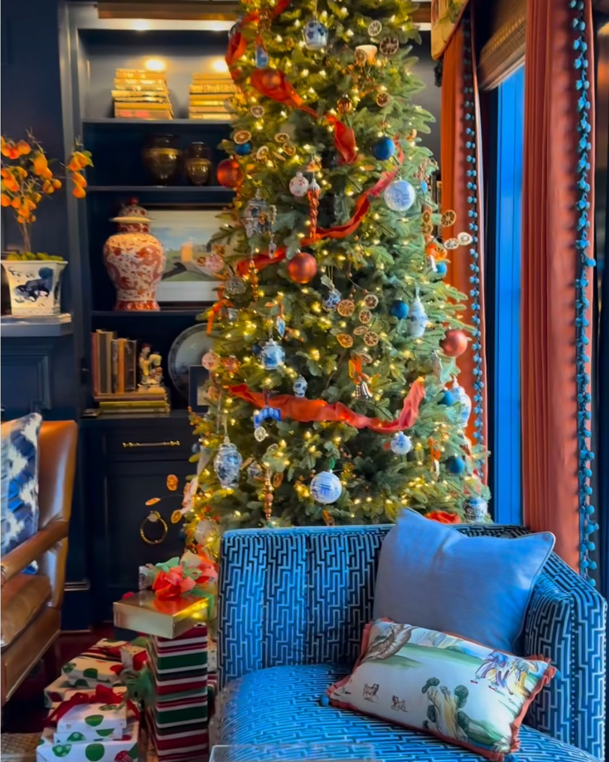 Christmas here in our personal home. I’ve linked some Christmas decor that is similar along with links to the exact wallpaper we have on the ceiling, the fabric and the orange canton jars. 