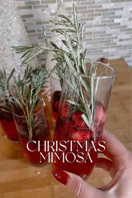 Christmas Mimosa 🌲🥂 

Add champagne/prosecco to glass first, then splash in cranberry juice to taste! 

For garnish, sprinkle fresh cranberries with edible glitter. 

Take fresh Rosemary sprigs & run under water to moisten, then dust in sugar (I use coconut sugar because the granules are larger).


#LTKSeasonal #LTKparties #LTKHoliday