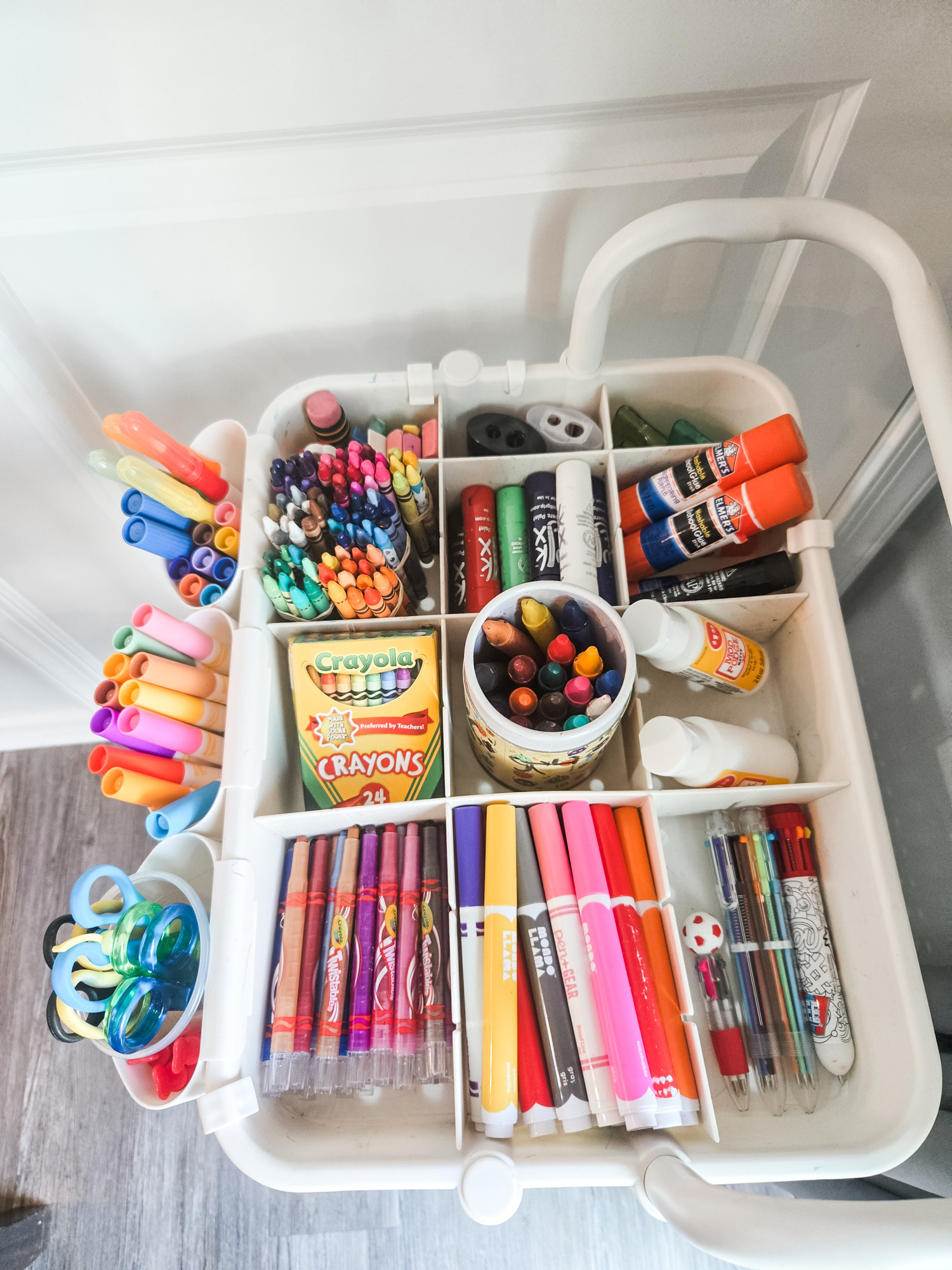 Kid's art supplies will forever be one of our favorite things to organize. It's all so colorful and fun, and putting everything in a three-tiered cart is just the icing on the cake! 🎂 

 