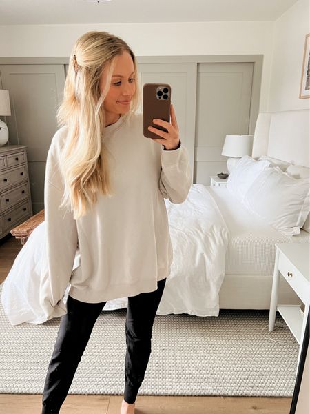 The cutest $14 oversized sweatshirt! I’m wearing XXL for that oversized look. Comes in so many cute neutral colors! Paired with my go-to lulu align joggers (size 2) 

#LTKstyletip #LTKunder50 #LTKFind