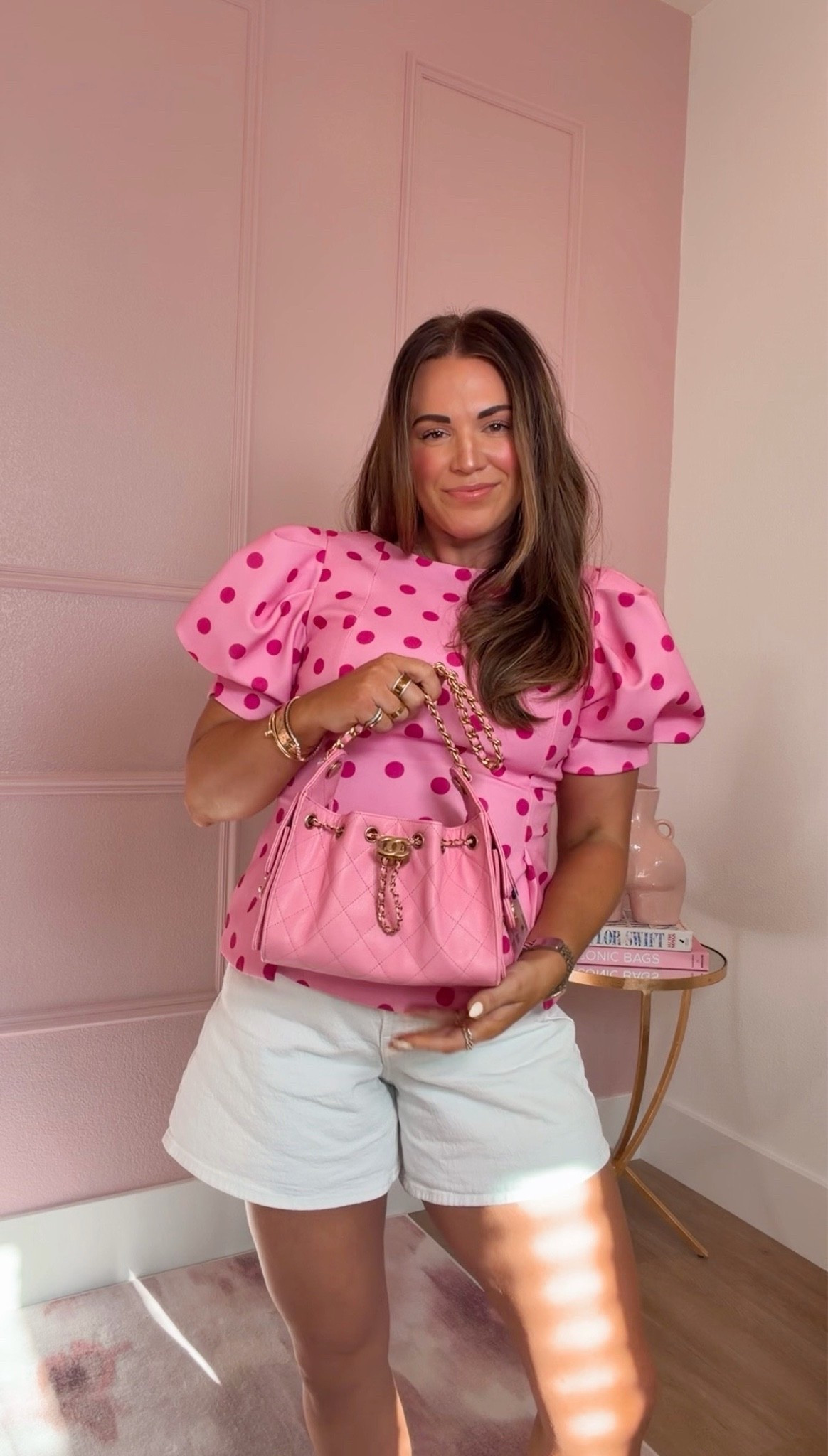 curvy midsize pink spring look! wearing size large in pink two tone polka dot top and size 30 in white denim shorts! flats and bag are Chanel 💕

#LTKMidsize #LTKSeasonal