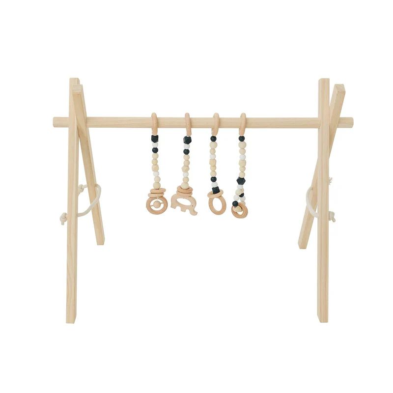 Wooden Baby Gym + Black Toys | Project Nursery