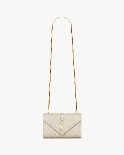 Envelope bag made with metal-free tanned leather, with a front flap and magnetic snap closure, de... | Saint Laurent Inc. (Global)
