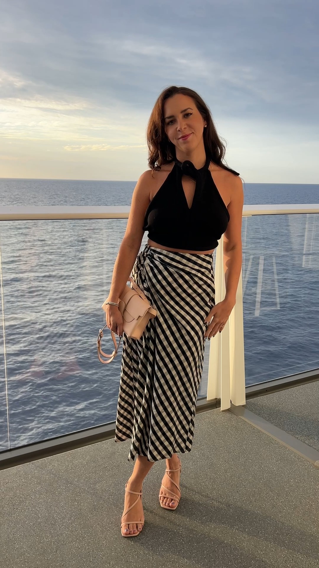 Summer outfit. Midi skirt. Checkered skirt. Crop top. Cult Gaia top. ALC skirt. Black and pink. Cruise outfit. Summer dressy. Outfit. Girls night out. Backless top. 

#LTKSummerEdit #LTKSeasonal #LTKTravel