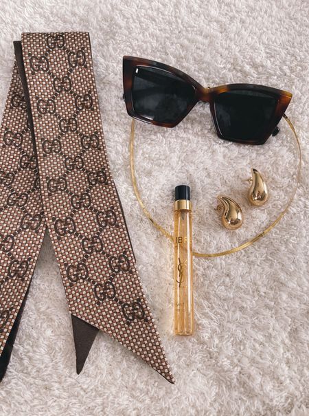 YSL sunglasses, Gucci silk scarf, Amazon gold drop earrings, spring accessories 

#LTKSeasonal #LTKfindsunder50