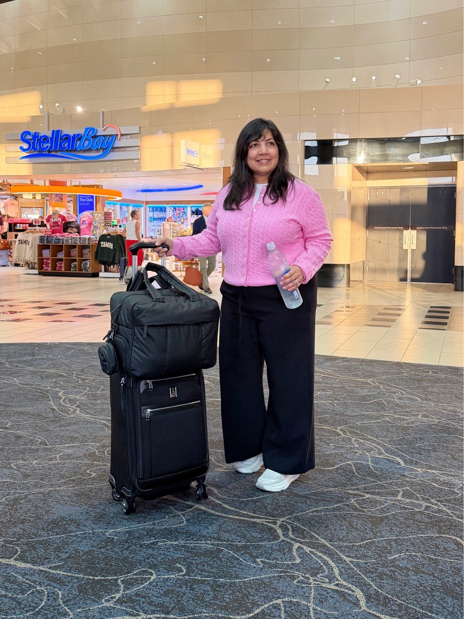 What to wear…travel outfit! This look is the perfect airport outfit that can be dressed up or dressed down with a quick shoe change. Wear sneakers on the plane and in the airport and then switch to ballet flats or a small heel when you get to your destination and you’ll be ready for work meetings or dinner out. These viral Aritzia lodge pants are such a good travel option because they’re comfortable, don’t wrinkle much and are perfect for elevating any casual or workwear look. They come in regular, petite / short and tall lengths. Such a great wardrobe staple for your capsule wardrobe and can be worn all year round! 

Travel outfits, airport outfit, spring outfits 2026, summer outfits, business casual workwear, work outfits, dinner outfit, midsize petite outfit

#LTKMidsize #LTKPetite #LTKTravel