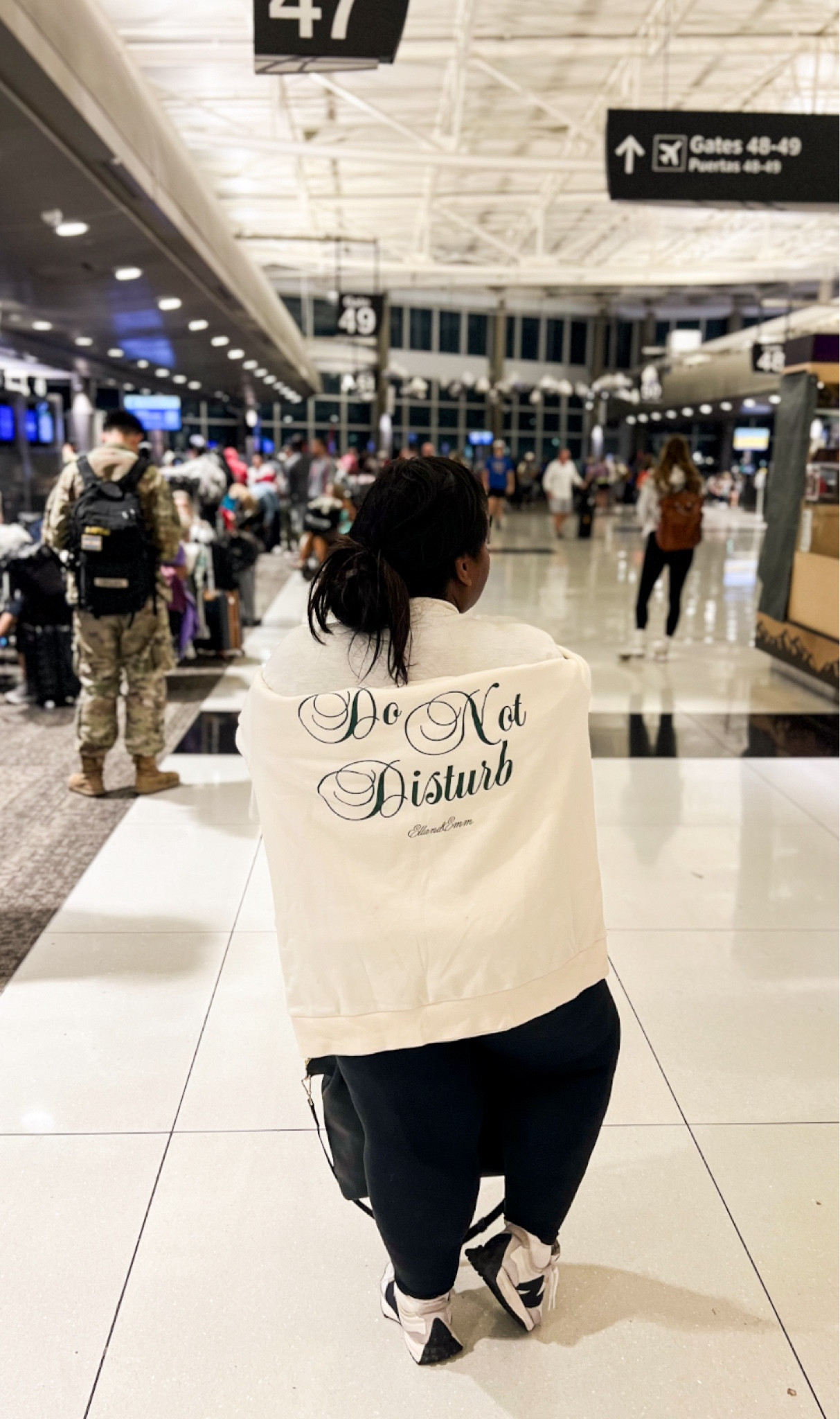 Comfy travel out inspo! The crossover leggings from Aerie are my go-to 👏🏽 I pair it with a graphic tee and my “Do Not Disturb” sweatshirt. My new balance sneakers 👟 keep my feet comfy! 

#LTKTravel #LTKStyleTip #LTKFindsUnder50