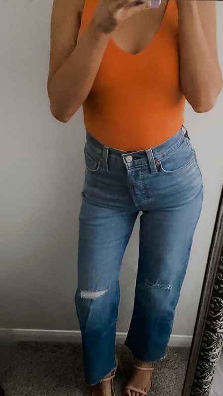 LOVE this orange bodysuit from Amazon for summer! I’m on the petite side (5’2”) and there is no extra fabric that bunches at the bottom like I normally find. These Levi jeans are also my new favorite! They are super comfy and flattering. 

#bodysuit #denim #petitefashion #petiteoutfit #summeroutfit #springoutfit #casualoutfit #levis #jeans #straightleg 

#LTKunder100 #LTKxPrimeDay #LTKFind