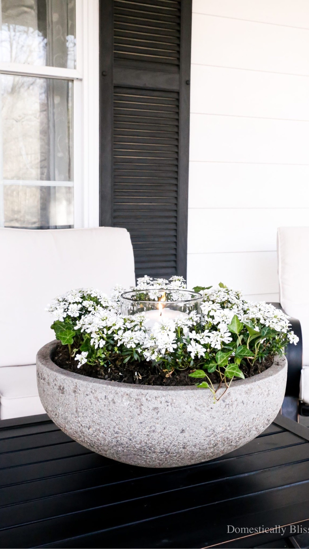 This DIY Potted Flowers Candle Holder has a hurricane candle holder in the center and is surrounded by planted flowers and ivy.

See details:
https://domesticallyblissful.com/diy-potted-flowers-candle-holder/



#LTKSeasonal #LTKHome