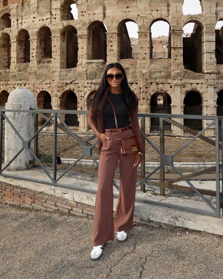 Outfit of the day in Rome! I have these brown pants in several different colors. So comfortable. I have also been wearing this black Calvin Klein top on repeat paired with my Adidas Samba OG sneakers! 

#LTKshoecrush #LTKtravel #LTKSeasonal