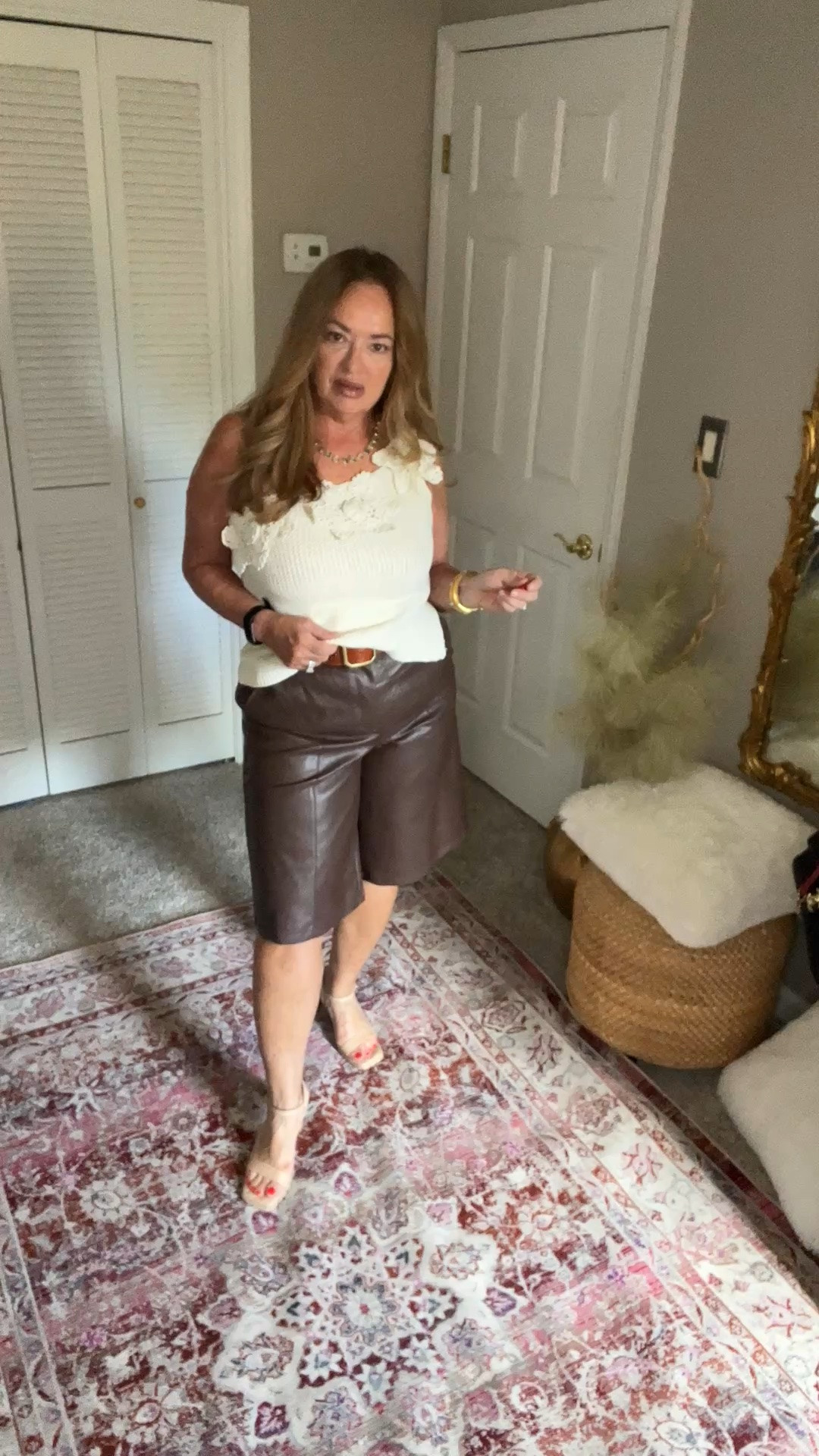 Chocolate brown faux leather Bermudas 
With this beautiful crochet floral appliqué asymmetrical knit blouse. 
Belt : old stud

#LTKdayinmylife #LTKgrwm #LTKootd