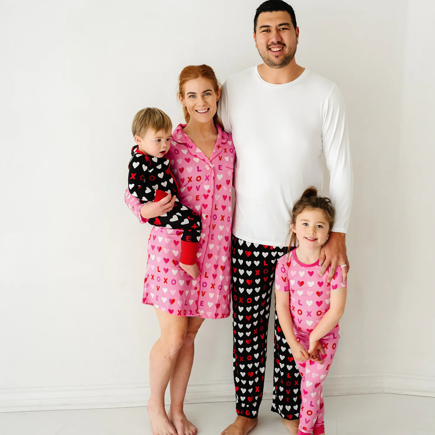 Black XOXO Zippy | Little Sleepies