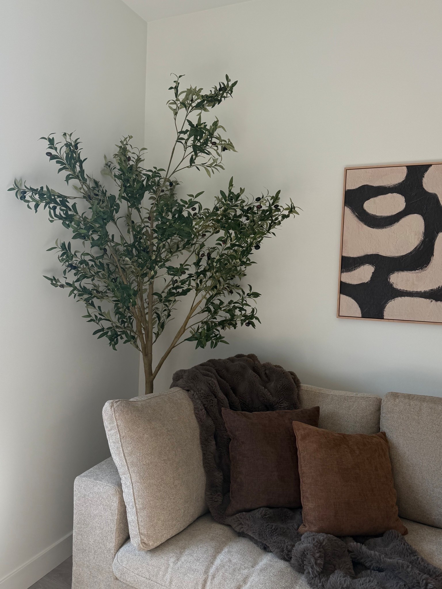 Love how this olive tree ties my living room together. I have both the 6 foot and 8 foot. This is the 8!

#LTKHome