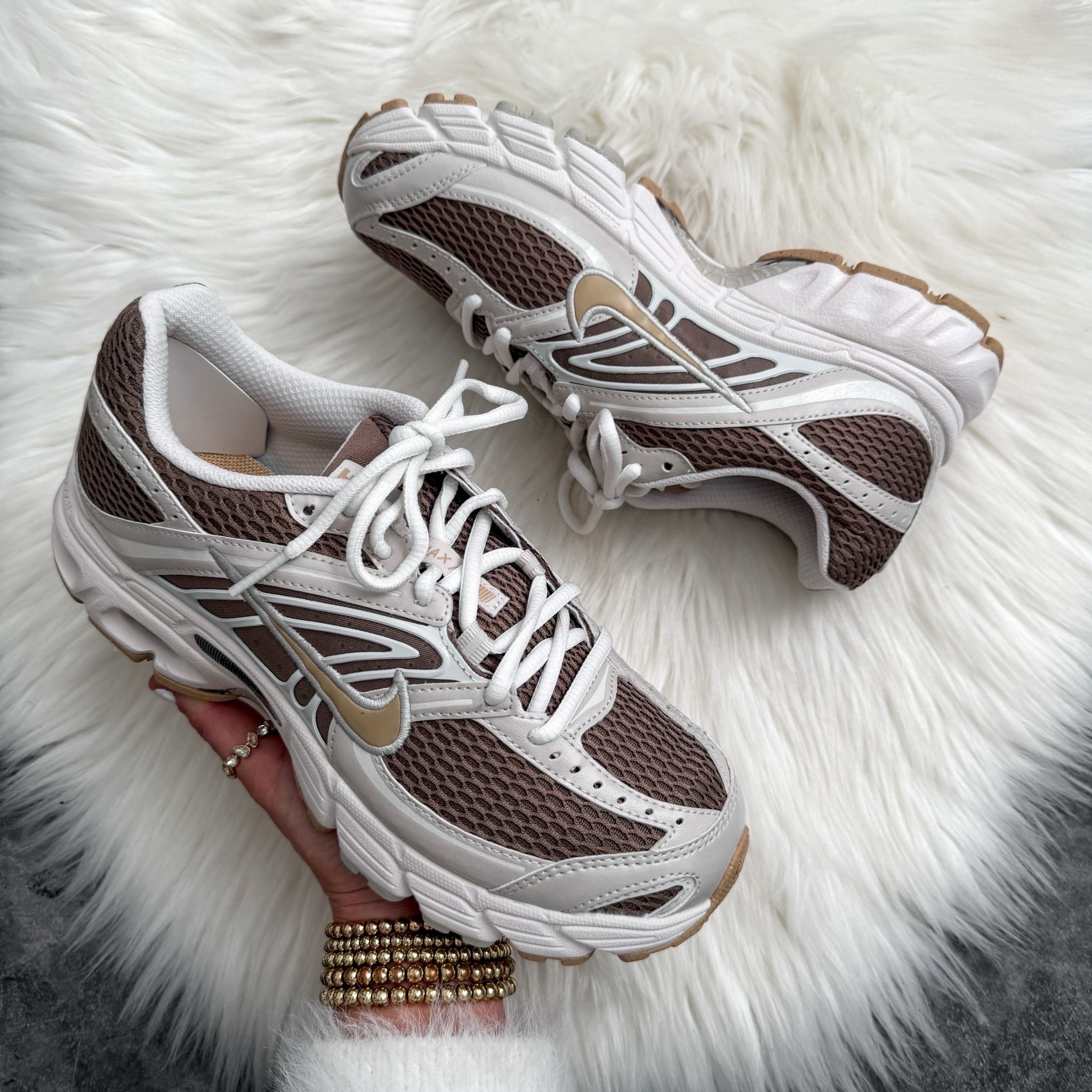 Woman’s Nike Air Max Moto 2K Sneakers. Runs true to size. Comes in over 10 colors. 