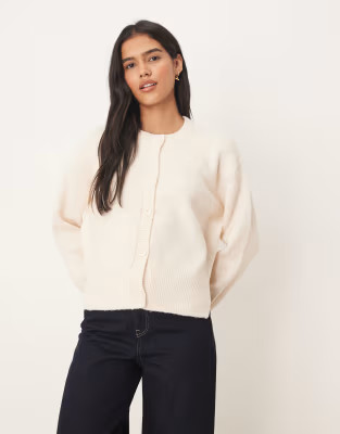 ASOS DESIGN boxy crew neck cardigan with side split detail in cream | ASOS (Global)