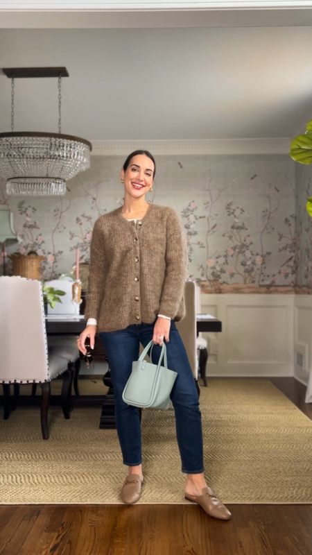 Fuzzy cardigan sweater, slim leg denim, blue leather mini bag, white long sleeved tee, roundie sunglasses 