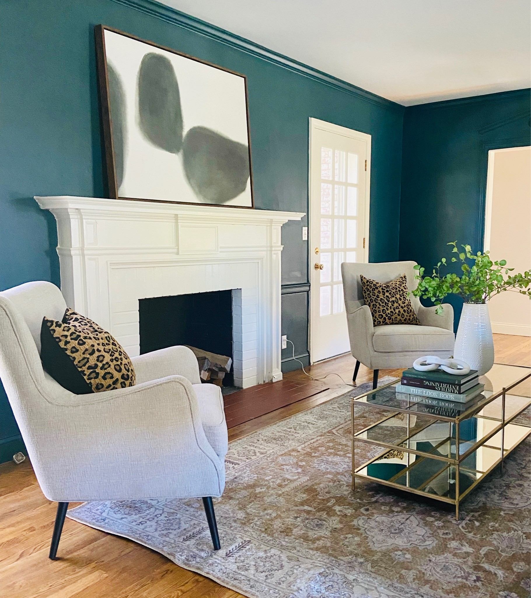 Use modern wingback upholstered chairs to add height and a cozy element in your space. 
.
.
.
Upholstered Wingback Chair
White Upholstered Accent Chairs
Metal Legs
Transitional
Modern 
Living Room Design 

#LTKhome #LTKstyletip #LTKbeauty