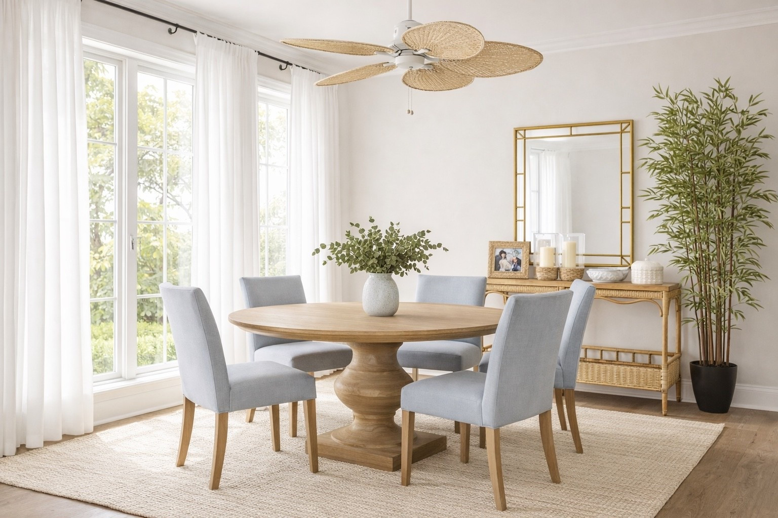 This Serena & Lily inspired dining room features a light and airy coastal design with a round wood pedestal table, soft blue upholstered dining chairs, and natural woven textures. Styled with a rattan console, gold mirror, and minimal decor, this space captures the signature coastal luxe aesthetic. Perfect for anyone looking to recreate a Serena & Lily look for less with neutral, timeless pieces and elevated styling. 

Shop tbr room below 💙

#LTKHome #LTKU #LTKSeasonal