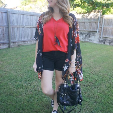 Black and red shorts and tee outfit with these black denim shorts, bright tee and black floral cover up. ❤️ Added to the darker colours with my Rebecca Minkoff Cupid bag and the Converse 🖤

#LTKitbag #LTKaustralia